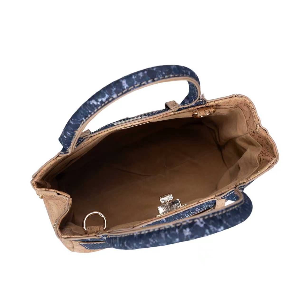 Sac à main en liège moucheté d'or avec finitions à motif denim et fermoir rotatif